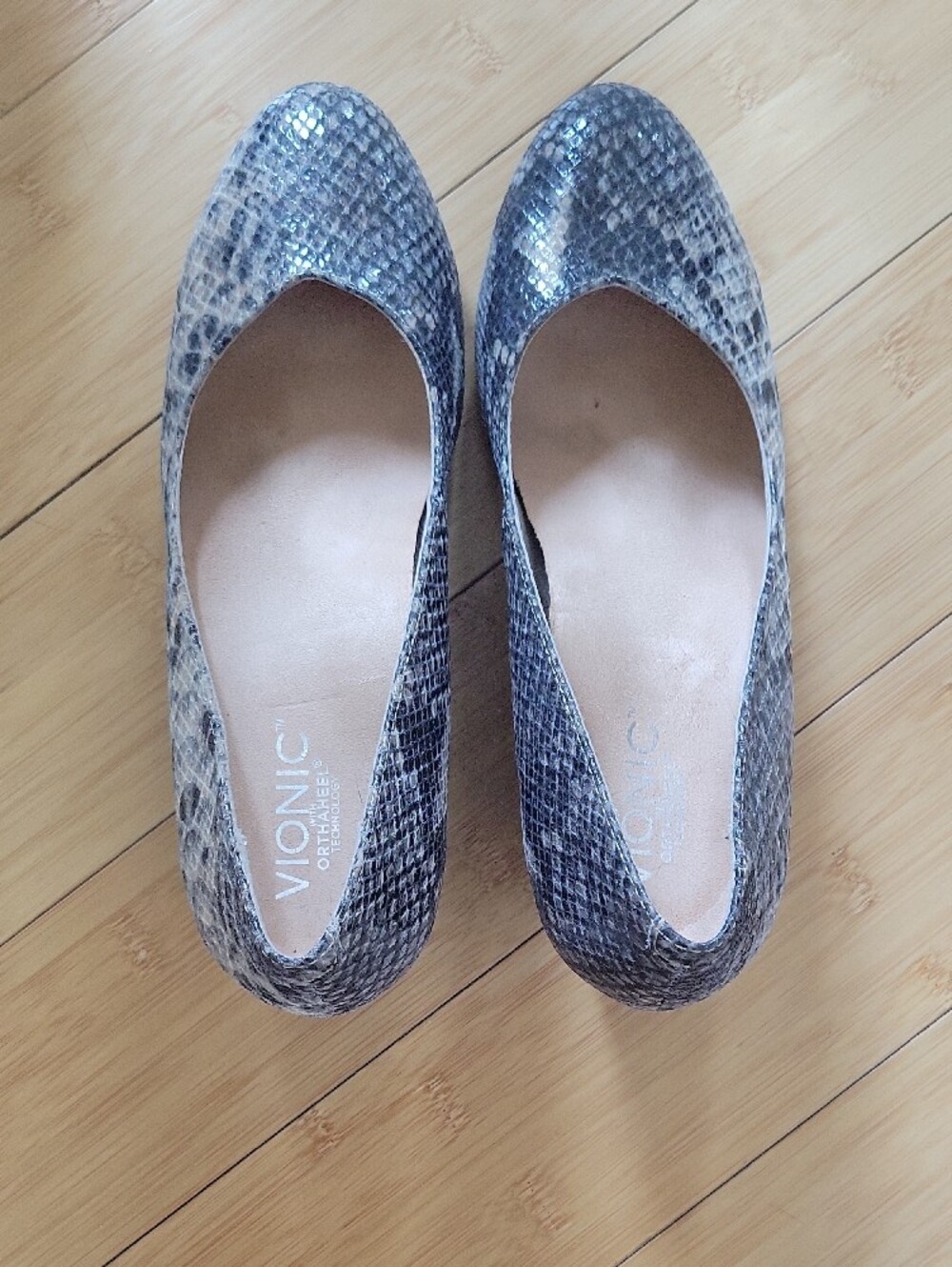 Vionic Women's Snake-Print Wedge  Pumps in Gray and Tan.